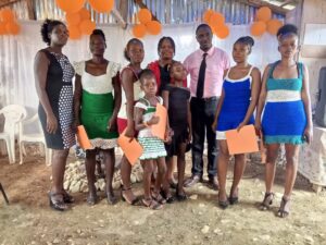 Pastor Olnick Duverne with a group of young at Bethleem professional